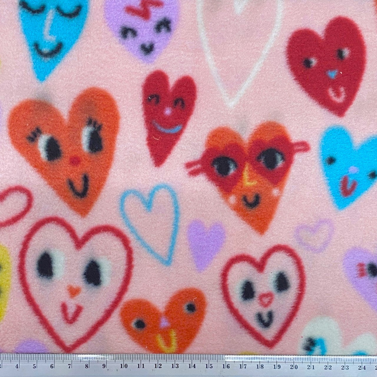 Printed Polar Fleece Fabric, Pink/Heart Faces- 150cm